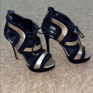 Black and gold heels